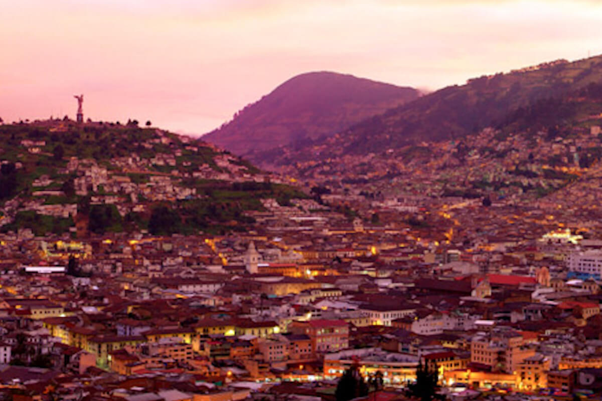 image: view of Quinto Ecuador at night