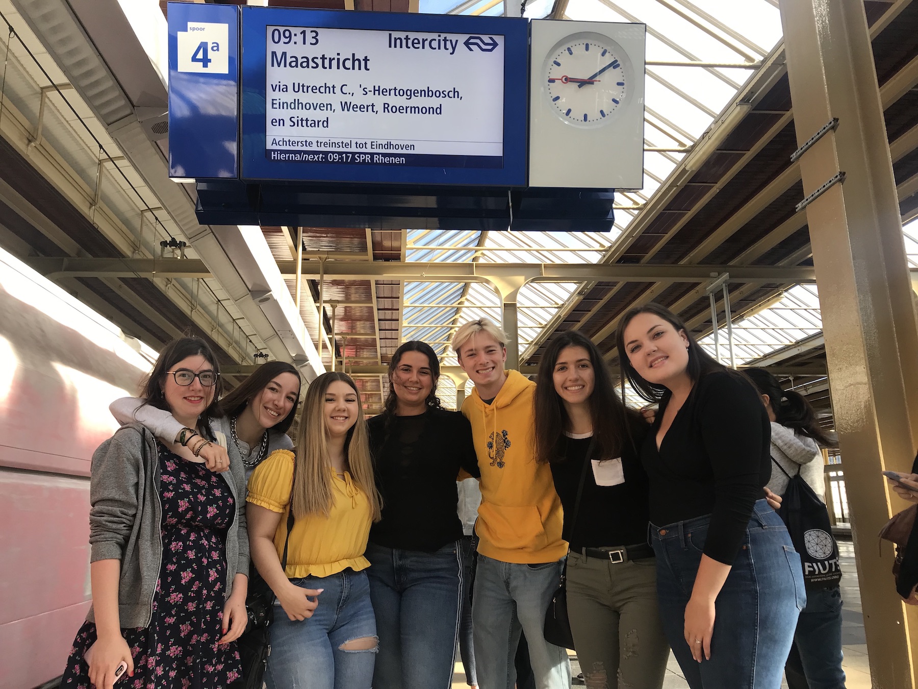 Students waiting to board a train in the Netherlands