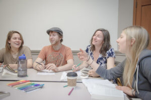 students learning and laughing in Mary Gates